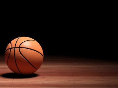 Basketball court floor with ball isolated on black and copy-space